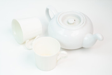 Pure white porcelain tea set, elegantly captured in a minimalist still-life.