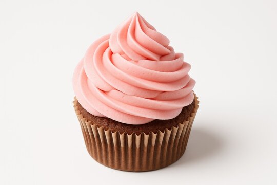 Sweet cupcake topped with pink cream against a white backdrop