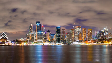 Naklejka premium Amazing panoramic night skyline of Sydney Harbour