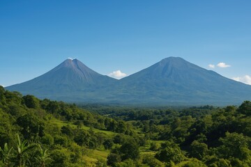 Fototapeta premium Scenic landscape featuring two mountains as seen from a small town in Central Java