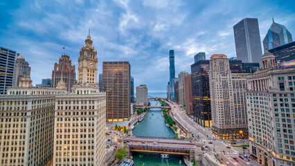 Chicago, IL - July 24, 2024: Aerial view of Riverfront and Skyscrapers at summer sunset