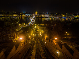 Budapest, Hungary &ndash; Night view of the Sz&eacute;chenyi Chain Bridge and Danube River seen from the Buda Castle Hill Funicular.