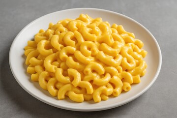 A bowl of cheesy macaroni on a neutral-colored surface