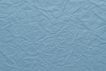 Blue-toned satin finish with a wrinkled paper appearance and a textured surface
