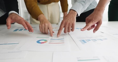 Hands pointing at printed charts and graphs on desk during collaborative business meeting, engaged in teamwork, data analysis, strategic planning, and decision-making in a corporate office, close up - Powered by Adobe
