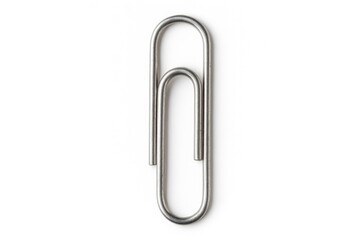 Macro photography of a paper clip against a white surface