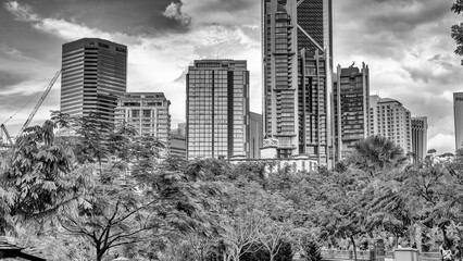 Kuala Lumpur, Malaysia - December 28, 2019: Kuala Lumpur skyline with towering skyscrapers viewed...