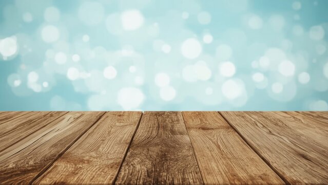 Natural wooden plank on a dreamy abstract blue bokeh background for showcasing