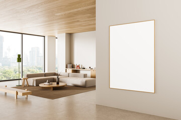 Modern interior with framed blank poster on beige wall in bright minimalist living room with city view through large windows and clean natural design concept. 3D Rendering