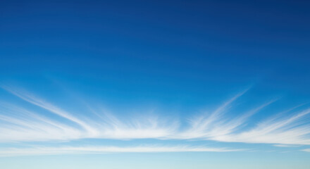 Wispy Cirrus Clouds Against A Clear Blue Sky atmosphere bright