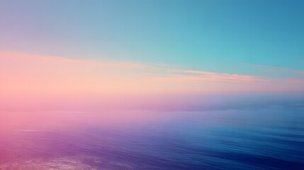 Fototapeta premium A tranquil view of a serene ocean, bathed in soft pastel hues of pink, purple, and teal, blending seamlessly into a pastel sky at sunset.