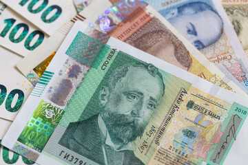 Fanned Bulgarian Lev Banknotes with a Euro Background