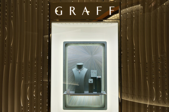 Shanghai,China-August 16th 2025: GRAFF brand logo and jewelry in store window