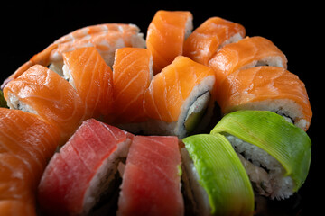 Sushi set with salmon, tuna, avocado, cream cheese and shrimp