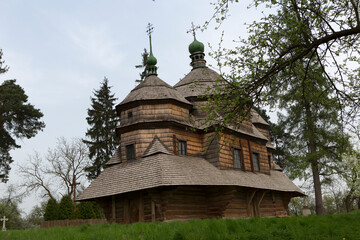 Ukraine Lviv region wooden churches on a cloudy summer day