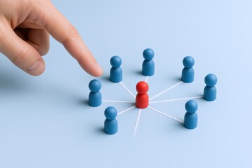 Human Resources Concept: Hand Selecting a Leader from a Group of Connected People