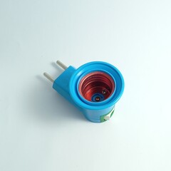 Electric Power Adapter Plug with Blue and Red Components on White Background