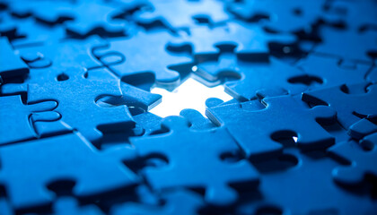 Blue puzzle pieces on blue background