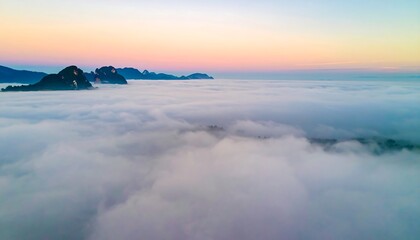 Obraz premium Misty mountain landscape at sunrise