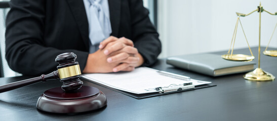 Female lawyer working with legal case document contract in office, law and justice, attorney,...
