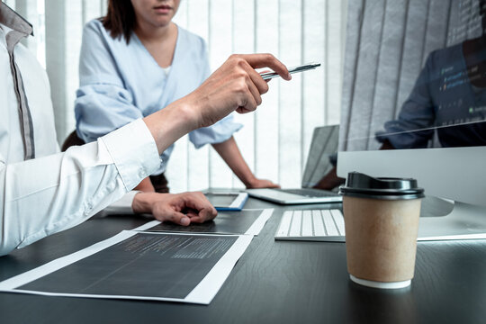 Team of Programmer working in software javascript computer in IT office, Writing codes and data code website and coding database technologies to find solution to problem