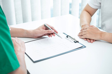 Doctor and patient are discussing consultation about symptom problem diagnosis of disease talk to the patient about medication and treatment method