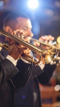 Close-up of jazz musicians playing trumpets