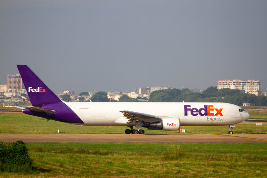 Ho Chi Minh City, Vietnam - November 8, 2021 : A Boeing 767-300F Airplane Of FedEx With Registration N107FE Preparing To Take Off.