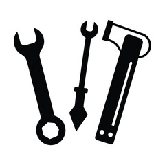 Silhouette illustration of three common hand tools wrench awl and hammer
