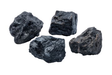 Four dark gray, irregularly shaped rocks.  Close-up, isolated on black.  Rough textures