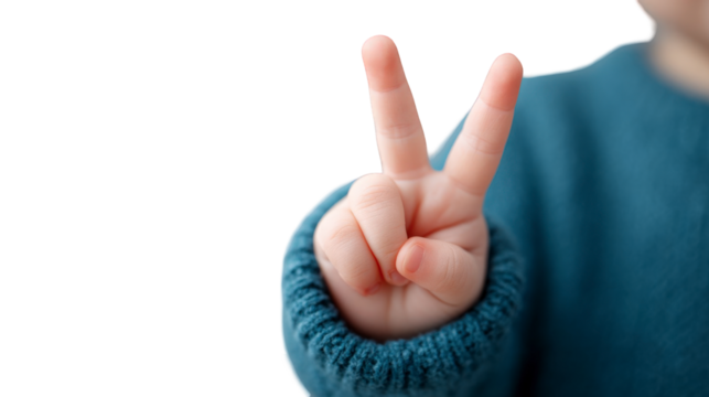 Childs hand making a peace sign isolated on transparent background