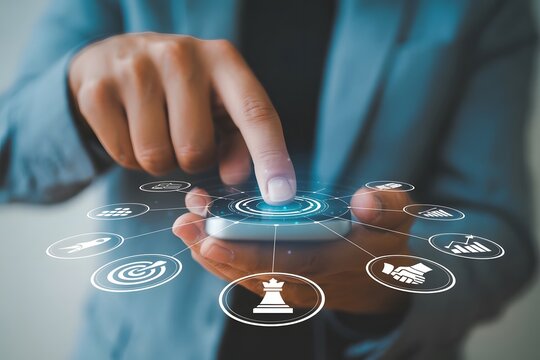 Businessman using a smartphone with business strategy icons representing digital transformation innovation and modern technology for business growth and success in the digital