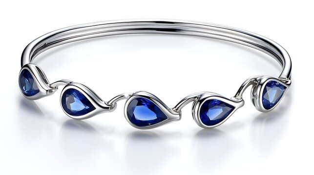 Sapphire bracelet with alternating shapes--pear, oval, and round--set in polished white gold, laid flat on a clean white surface, realistic reflections on gems and metal, full frame,