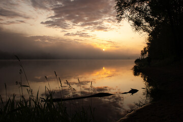 sunrise over the foggy river in Toruń © Przemylsaw Budzynski