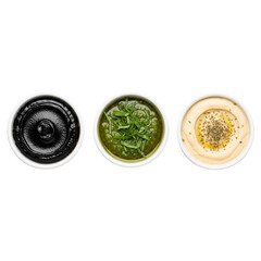 Three small bowls of dips and sauces