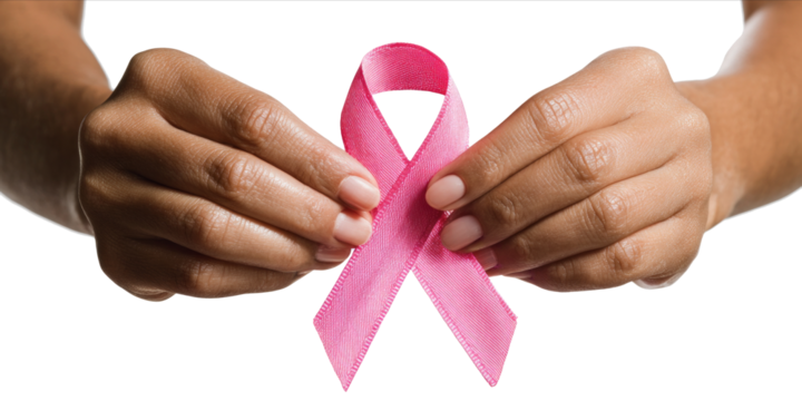 Woman hands holding pink ribbon over transparent white background, breast cancer awareness, cancer awareness day