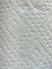 White paper towel close-up, embossed diamond pattern seamless texture backgroun