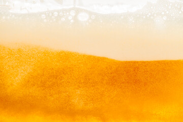 Obraz premium Close up bright orange Oil or beer splash texture and nature waves, Beautiful waves curve and little bubbles smooth for graphic design and background, Oil Bubbles, Soft beer bubbles, Selective focus