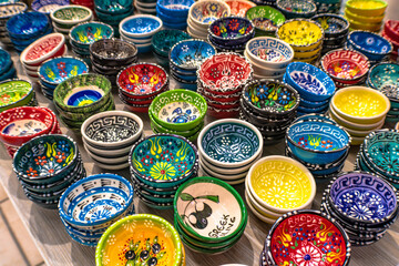 Close up of colorful Greek souvenirs, handmade ceramic bowls, Rhodes, Greece
