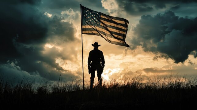 A dramatic silhouette of a figure in jackboots standing in front of a flag under stormy skies - Powered by Adobe