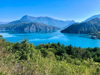 Serre-Ponçon lake in French Alps, aerial view, blue turquoise water