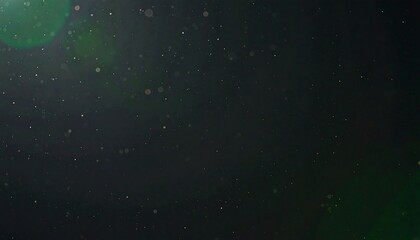 Dark background speckled with light particles