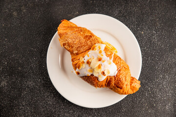 Croissant almond freshly baked sweet dessert tasty snack fresh delicious gourmet food background on the table  rustic food top view copy space