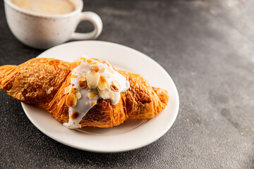 Croissant almond freshly baked sweet dessert tasty snack fresh delicious gourmet food background on the table  rustic food top view copy space