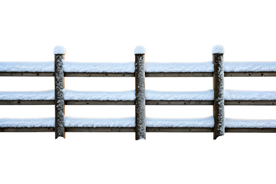 Rustic wooden farm fence with posts covered in fresh snow isolated with transparent background