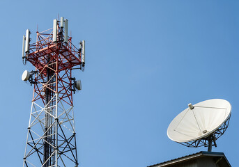 Telecommunication tower and satellite dish against a clear blue sky for wireless communication and signal transmission