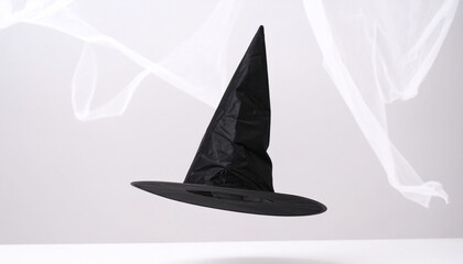 Fototapeta premium Floating Black Hat with White Negative Space