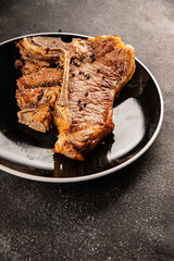 t-bone steak roast cut of meat juicy roast beef tasty snack fresh delicious gourmet food background on the table rustic food top view copy space