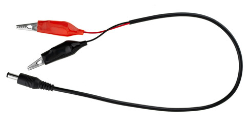 Insulated wire with crocodile clips at the ends and a connector, on a white background in insulation