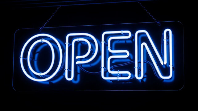 Glowing blue neon open sign illuminated against a black background, a classic symbol for a store or bar.